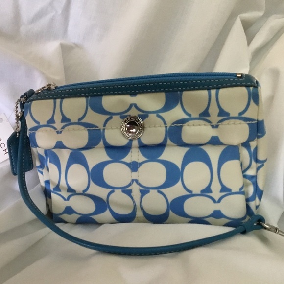 Coach Handbags - NWT: COACH: Wristlet..cosmetic bag...multi purpose